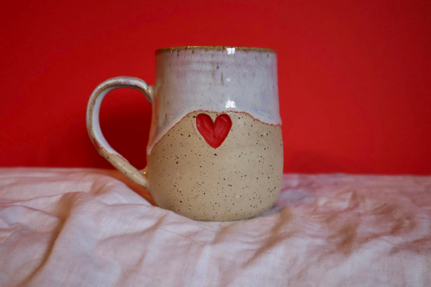 Drippy mug with carved heart