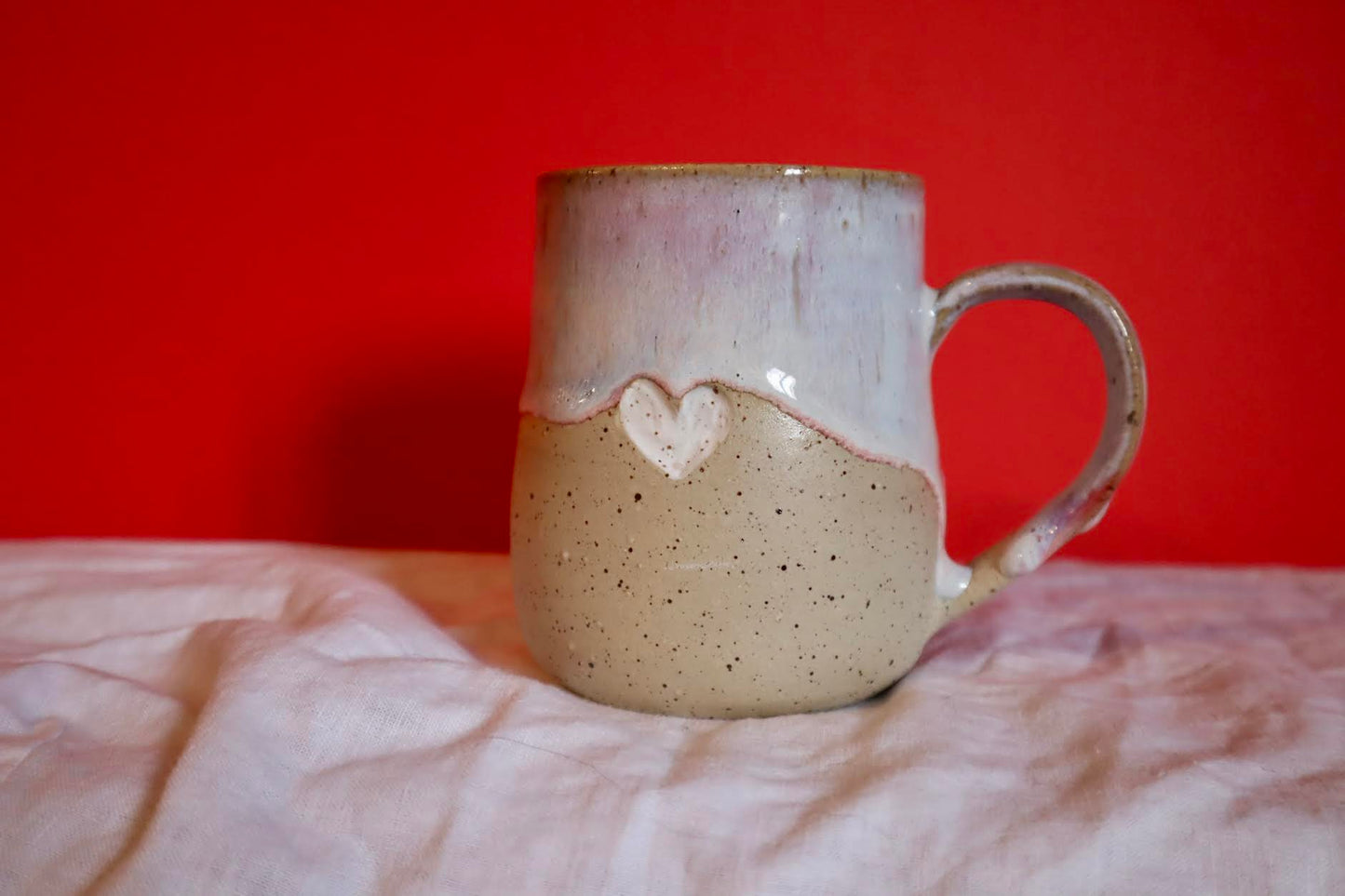 Drippy mug with carved heart